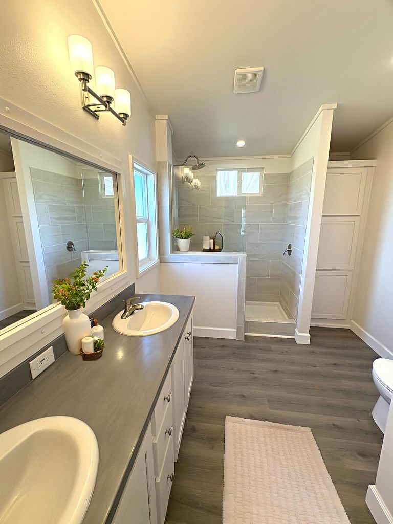  Virtually staged. Stunning amentities w/ tiled shower & tons of storage. 