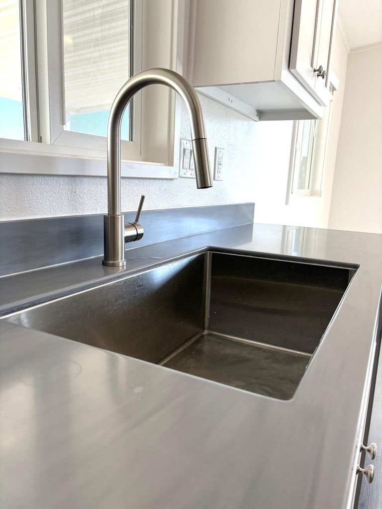  Deep stainless steel sink. 